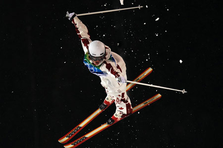 Olympic skier in the air