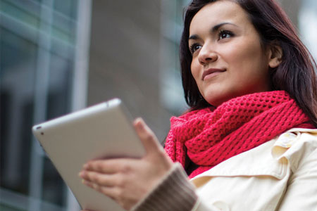 Woman holding a tablet